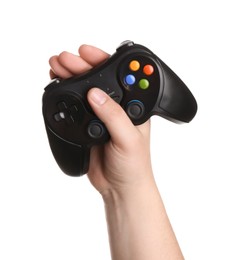 Woman holding wireless game controller on white background, closeup