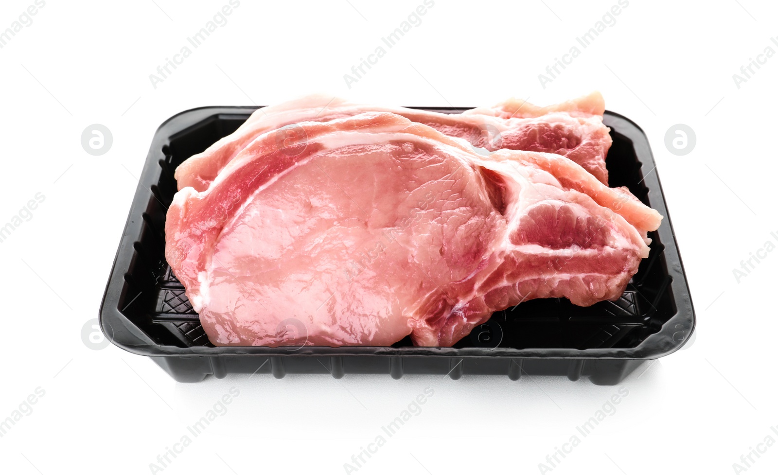 Photo of Plastic container with raw steaks on white background. Fresh meat