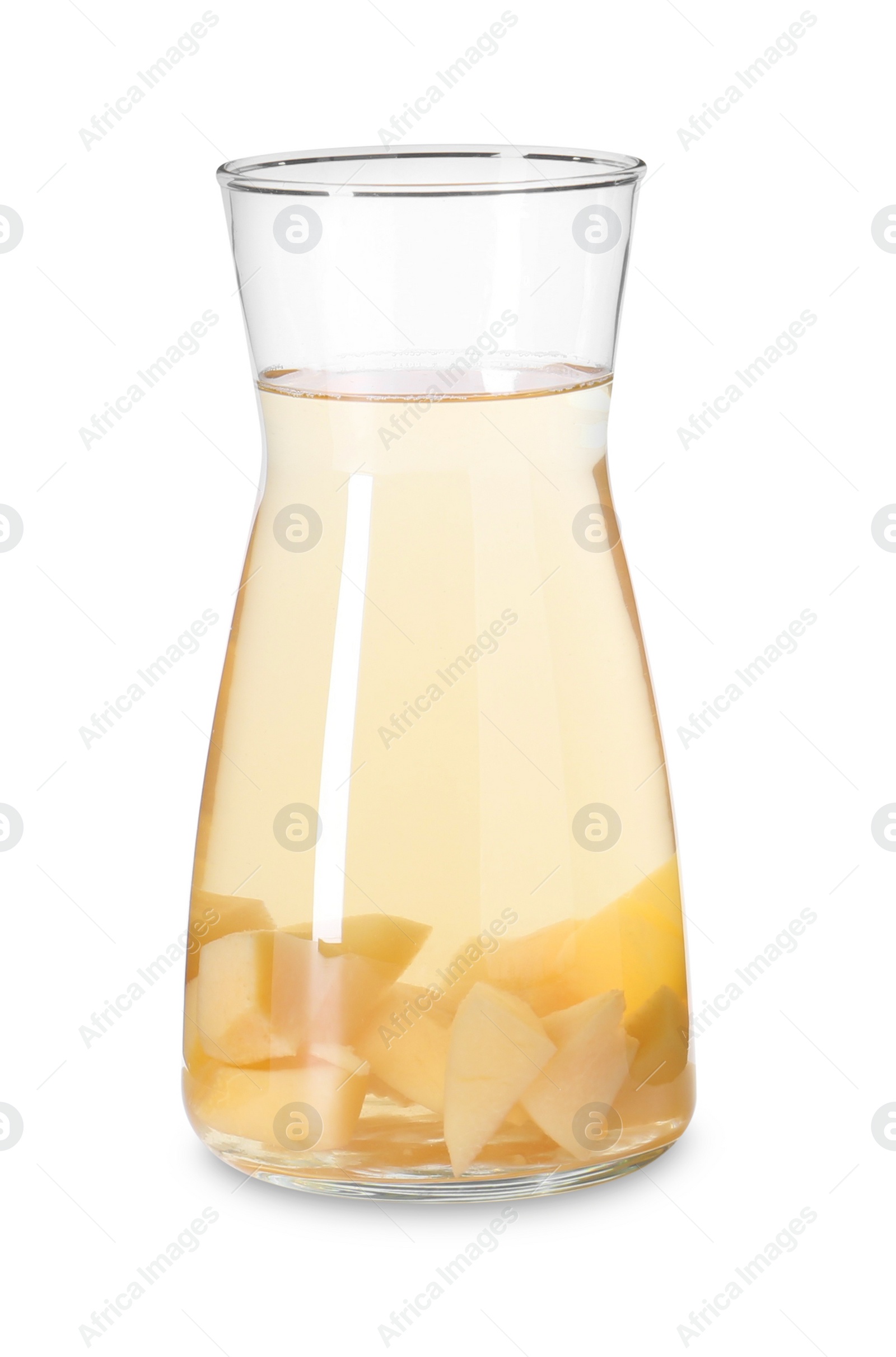 Photo of Tasty quince drink in glass carafe isolated on white