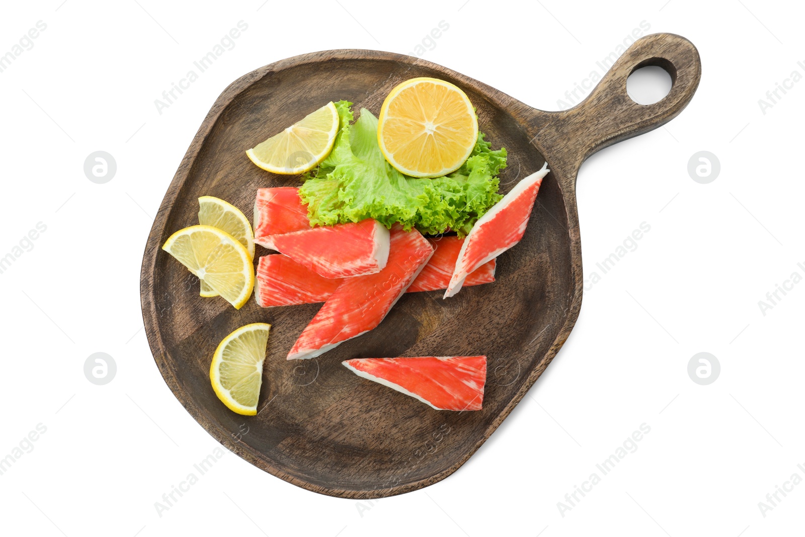 Photo of Serving plate with cut crab sticks on white background, top view