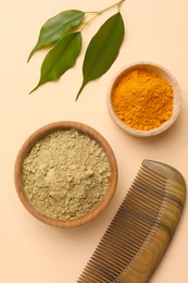 Flat lay composition with henna and turmeric powder on beige background. Natural hair coloring