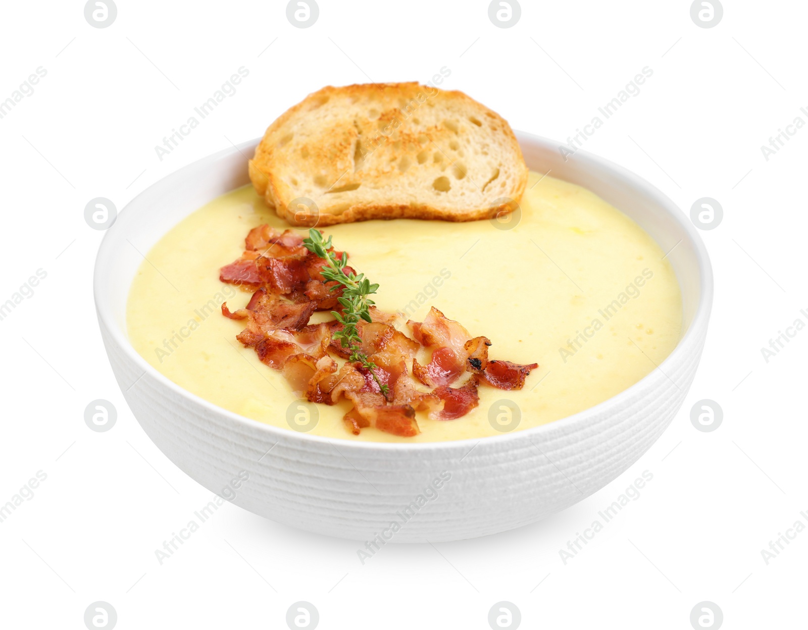 Photo of Tasty potato soup with bacon and crouton in bowl isolated on white