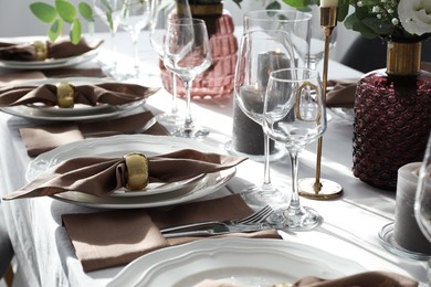 Photo of Festive table setting with beautiful decor indoors