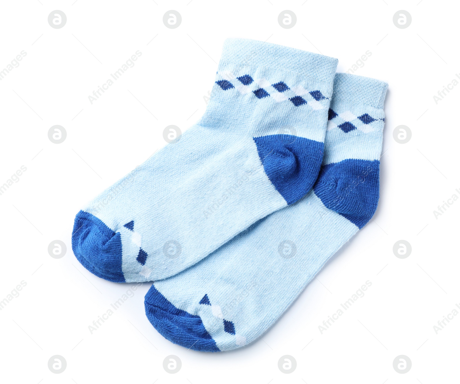 Photo of Cute child socks on white background, top view