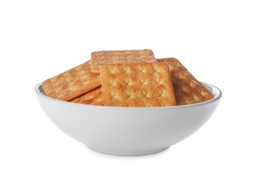 Photo of Delicious crackers in bowl isolated on white