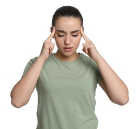 Photo of Young woman suffering from headache on white background