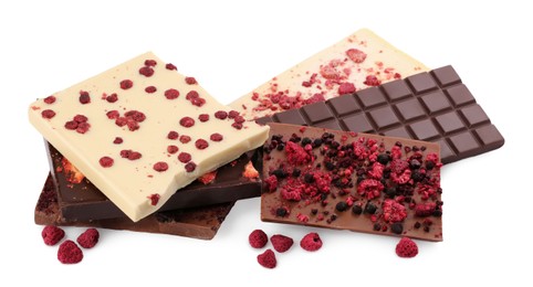 Chocolate bars with freeze dried berries on white background