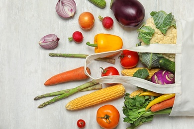 Photo of Flat lay composition with fresh vegetables on light background