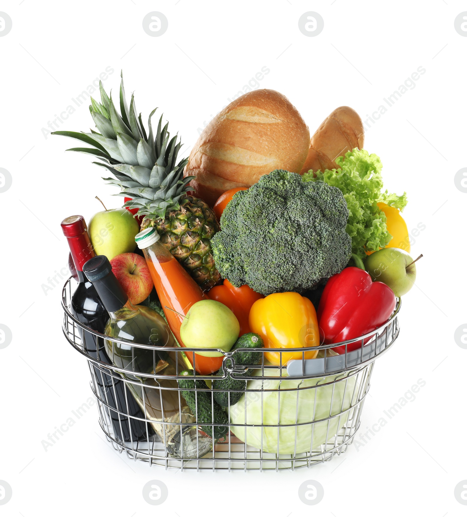 Photo of Shopping basket with grocery products on white background