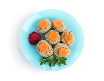 Photo of Plate of traditional Passover (Pesach) gefilte fish isolated on white, top view