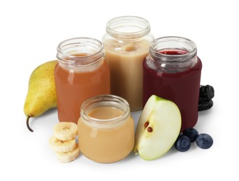 Photo of Jars with healthy baby food, blueberries, prunes and fresh fruits isolated on white