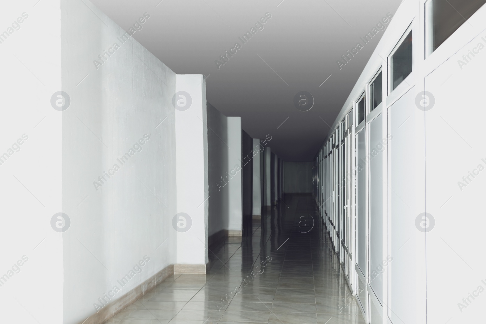 Photo of Modern empty office corridor with white walls