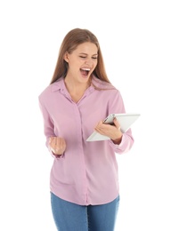 Photo of Emotional young woman with tablet celebrating victory on white background