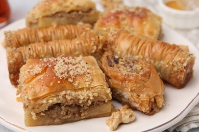 Eastern sweets. Pieces of tasty baklava on table, closeup