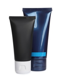 Photo of Tubes of men's facial creams on white background. Mockup for design