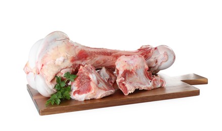 Photo of Raw meaty bones and parsley on white background