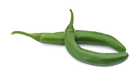 Photo of Green hot chili peppers on white background