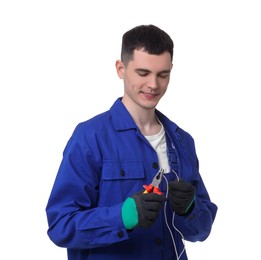 Photo of Young man holding pliers on white background