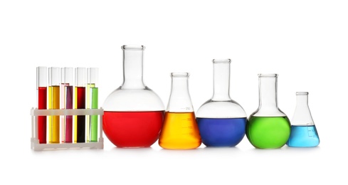 Photo of Chemistry glassware with color samples isolated on white