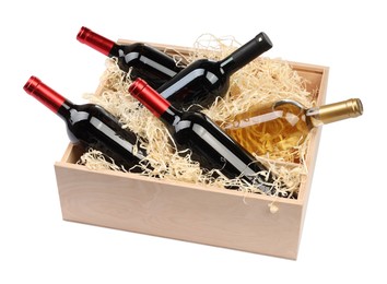 Photo of Wooden gift box with wine bottles isolated on white