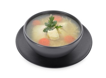 Photo of Tasty chicken soup with carrot and parsley in bowl isolated on white
