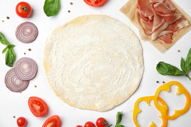 Photo of Flat lay composition with dough and fresh ingredients for pizza on white background