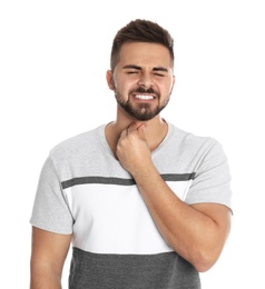 Photo of Man suffering from throat pain on white background