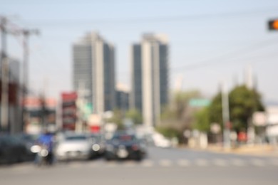 Photo of San Pedro Garza Garcia, Mexico – March 20, 2023: Blurred view of road with cars and buildings, bokeh effect
