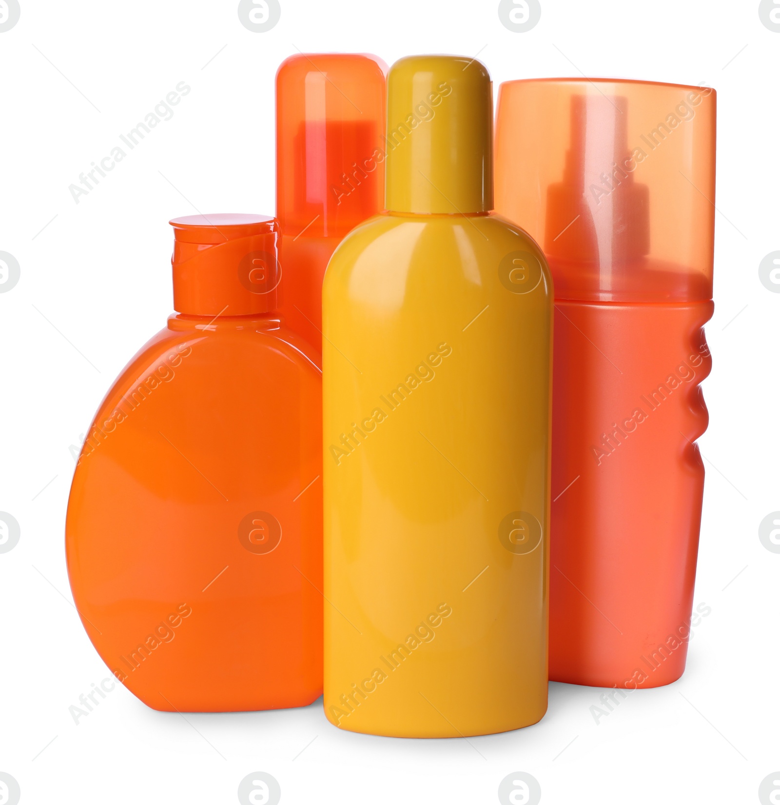 Photo of Bottles with sun protection products isolated on white