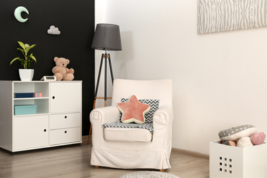 Photo of Modern child room interior with stylish furniture