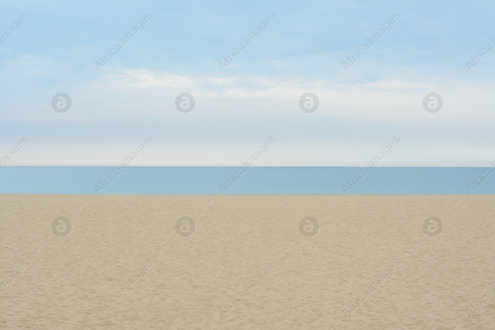 Photo of Picturesque view of sandy beach near sea