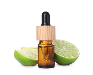 Bottle of citrus essential oil and cut fresh lime isolated on white