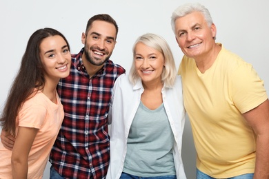 Portrait of happy family on white background