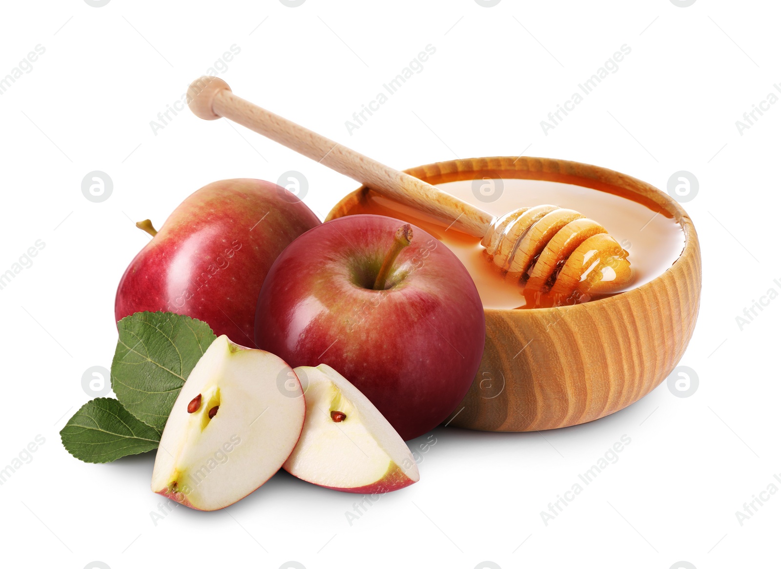 Image of Honey in bowl and apples isolated on white