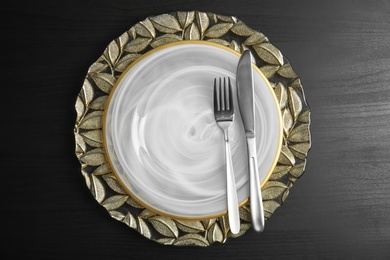 Photo of Elegant table setting on dark background, top view