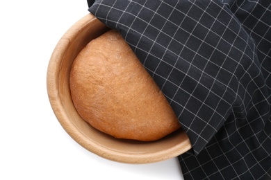 Photo of Bowl with raw rye dough on white background, top view