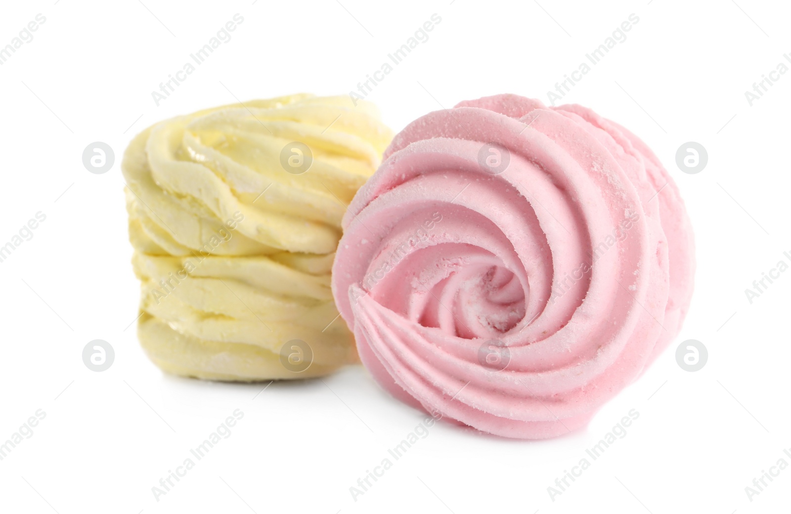 Photo of Two different delicious zephyrs on white background
