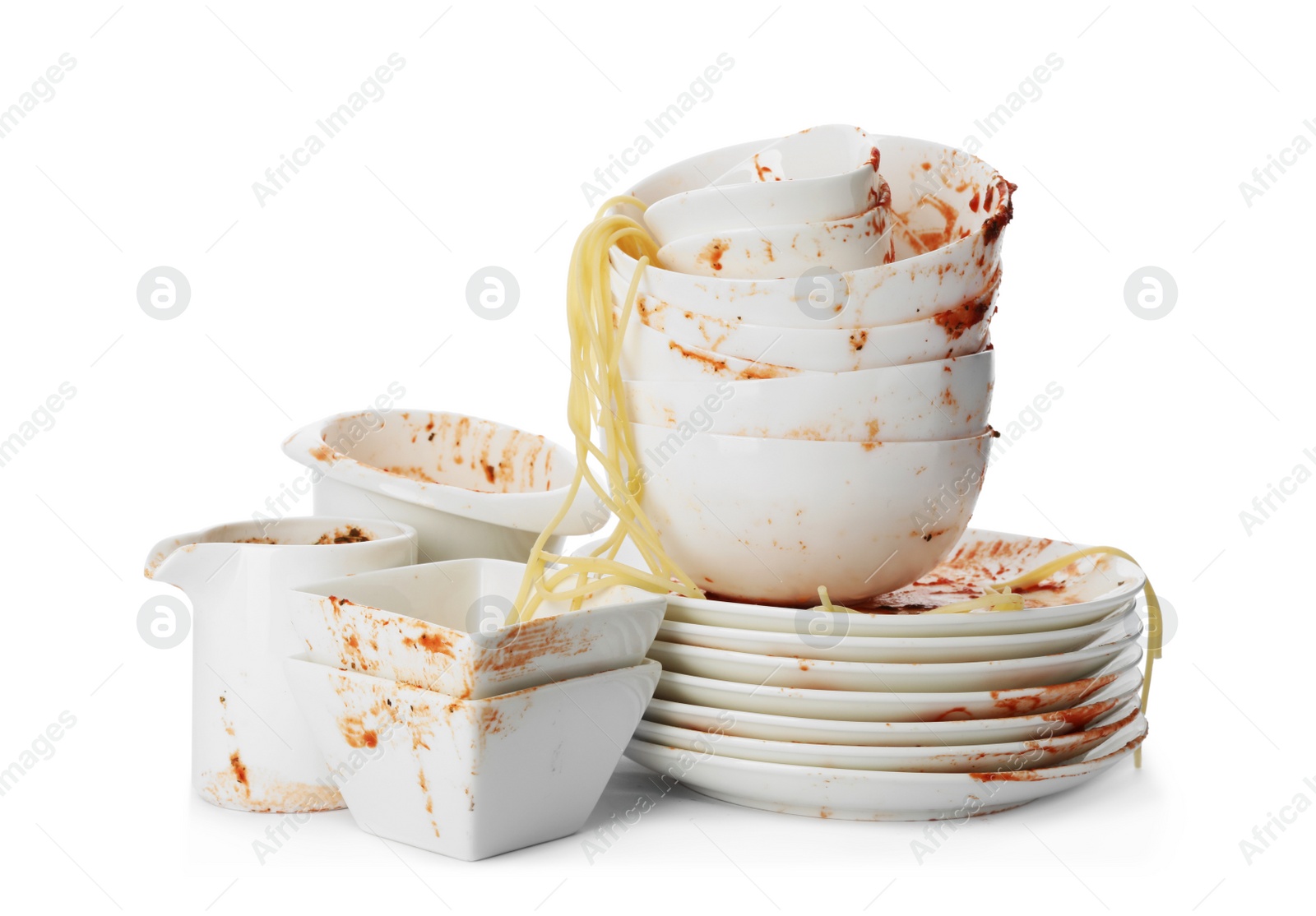 Photo of Set of dirty dishes with spaghetti leftovers isolated on white