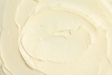 Photo of Texture of tasty butter as background, top view