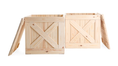 Photo of Pair of open wooden crates isolated on white