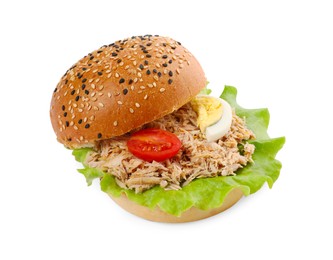 Delicious sandwich with tuna, boiled egg and vegetables on white background