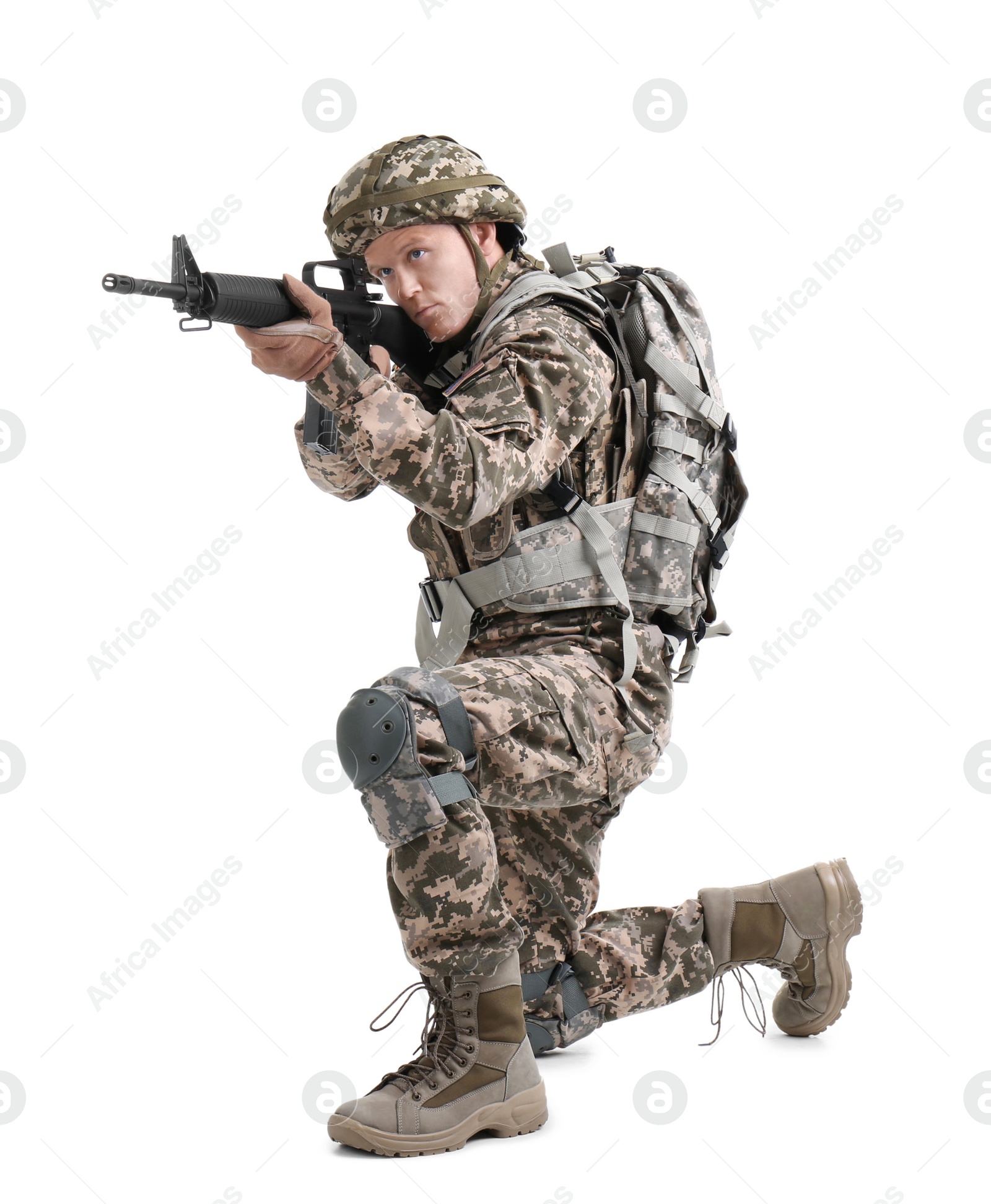 Photo of Male soldier with machine gun on white background. Military service