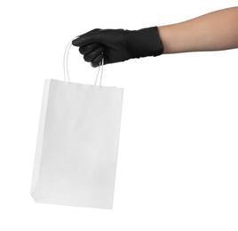 Photo of Woman holding shopping paper bag on white background