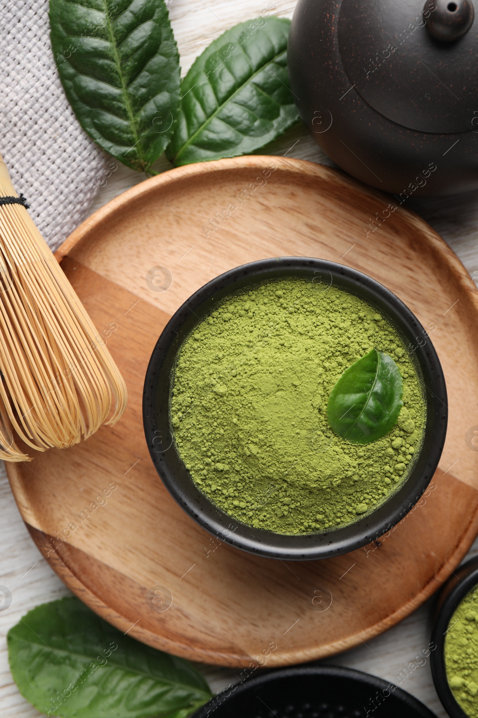 Photo of Flat lay composition with green matcha powder on table