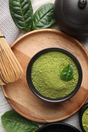 Photo of Flat lay composition with green matcha powder on table