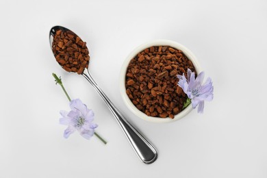 Photo of Chicory granules and flowers on white background, top view