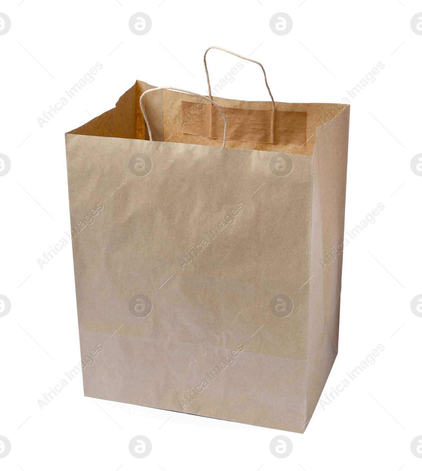 Photo of Kraft shopping paper bag isolated on white