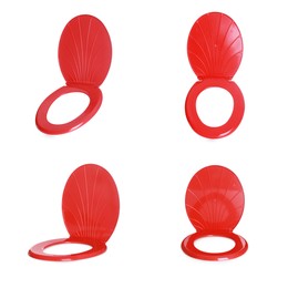 Image of Set with red plastic toilet seats on white background