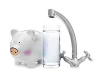 Image of Water scarcity concept. Piggy bank, tap and glass on white background