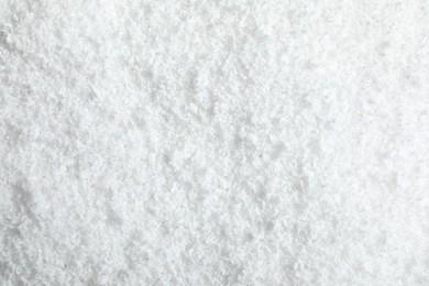 Photo of Pile of white snow as background, top view